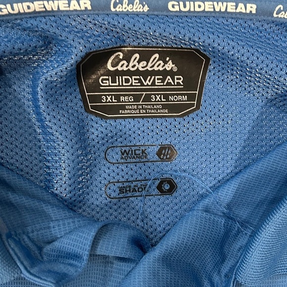 Cabelas Blue Polo Shirt with Short Sleeves and Textured Fabric - Picture 2 of 4